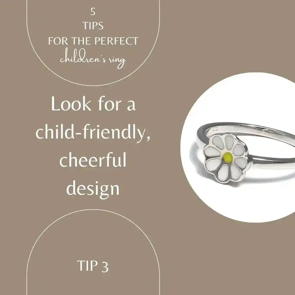 The lettering on the picture shows a child-friendly and cheerful design. The picture itself is beige, white and gold and shows a child's ring in the shape of a daisy. The image is clickable and linked to the daisy children's ring.