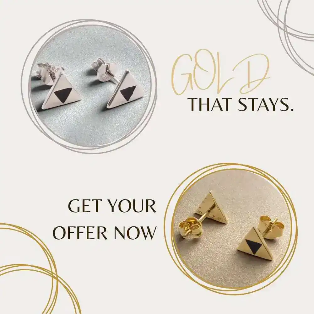 Gold that stays. Close-up of silver and gold-plated stud earrings with a shiny surface and enamel inlay - high-quality gold plating for a lasting impression.
